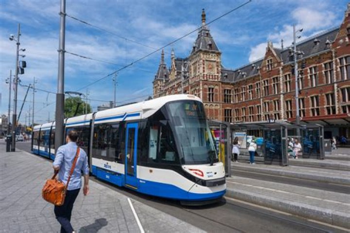Do children pay for public transport in Amsterdam?