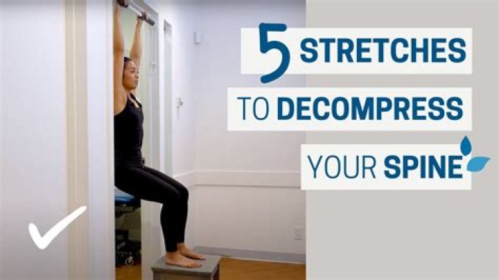 How do I decompress my mid spine at home?