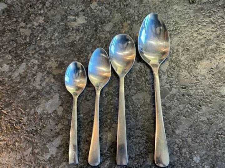 How many table spoons of flour is 75g?