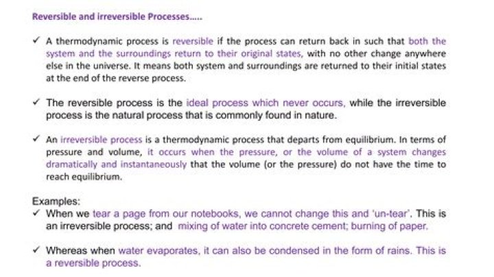 What are examples of reversible and irreversible processes in the real world?