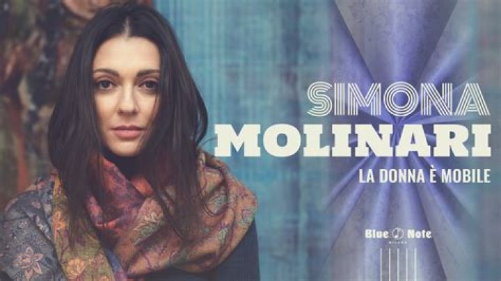 What does La donna e mobile mean in Italian?