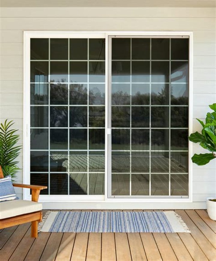 What is the standard size for a sliding patio screen door?