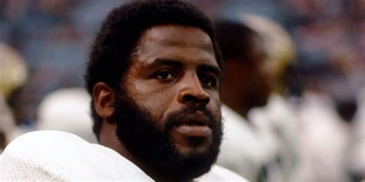 What NFL records does Earl Campbell hold?